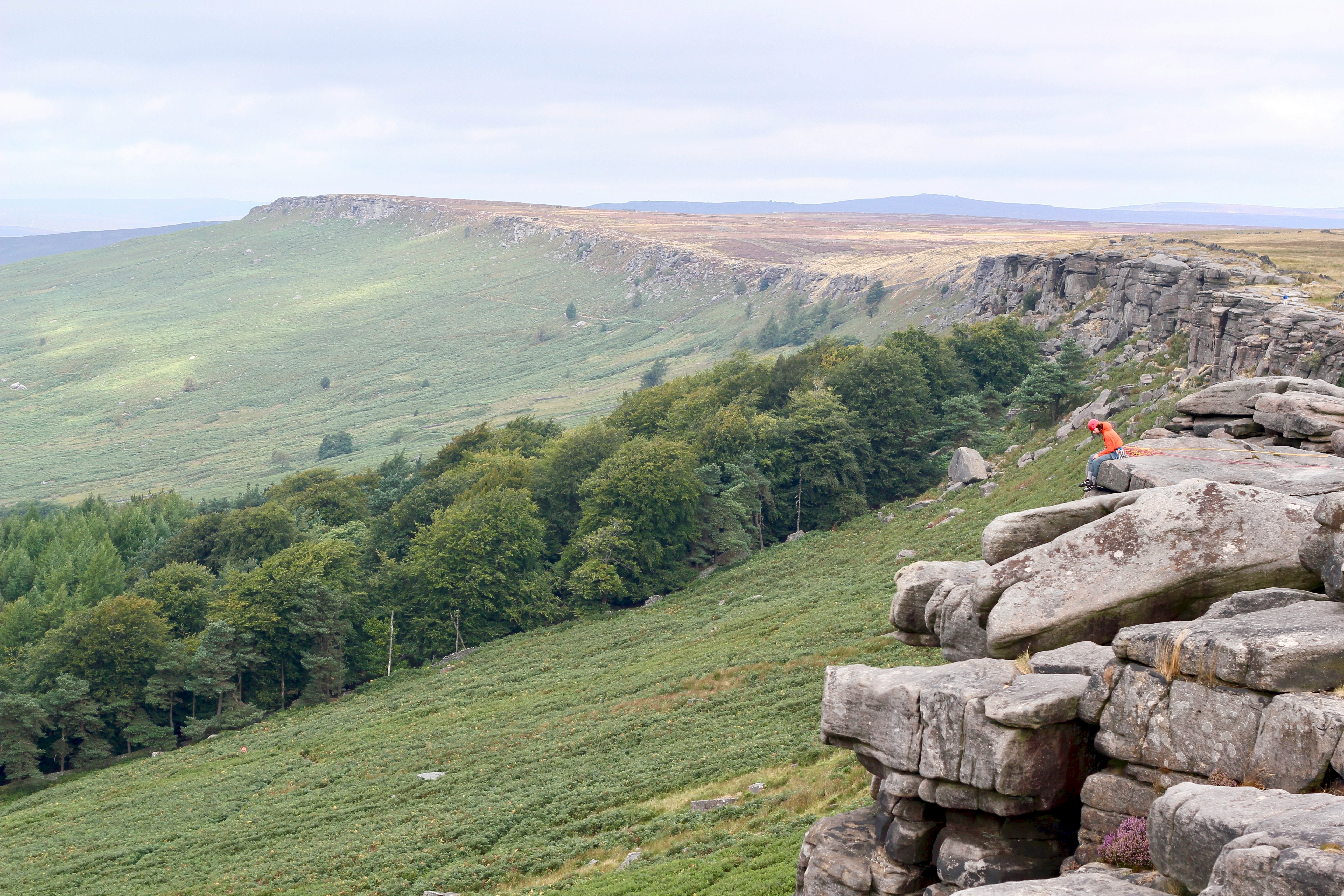 Panoramic countryside views from Stanage Edge, showing rolling Derbyshire moors, distant hills, and open skies